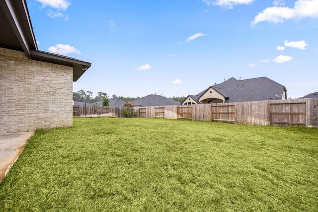 734 Platinum Stone Lane, Pinehurst, TX 77362