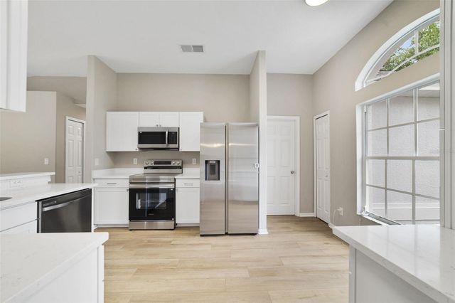 13850 RIVERPATH GROVE DRIVE, Orlando, FL 32826