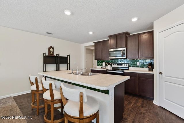 65138 FOREST GLEN Lane, Yulee, FL 32097