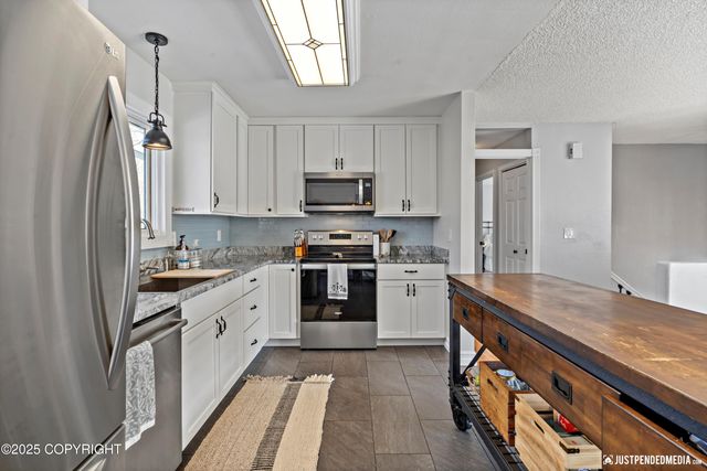 17969 Meadow Creek Drive, Eagle River, AK 99577
