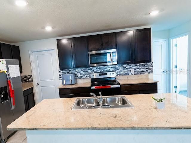 5509 LOGAN CAVE AVENUE N, Wimauma, FL 33598