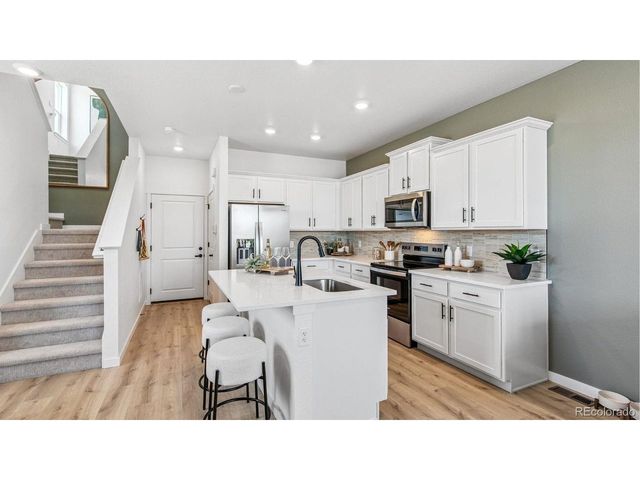 1410 S Boston Ct A, Denver, CO 80247