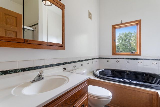 2455 Queensport Road, Woodbury, MN 55125
