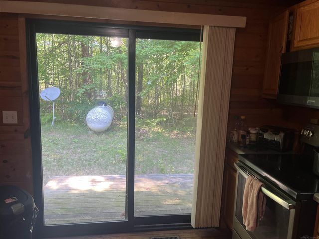 10090 Snowbowl Road, Houghton Lake, MI 48629