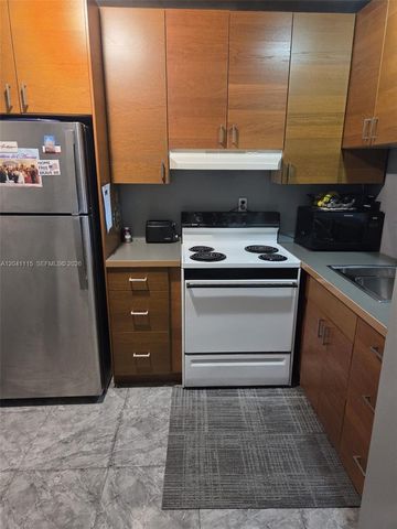 496 NW 165th St Road D214, Miami, FL 33169