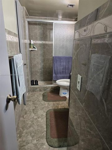 496 NW 165th St Road D214, Miami, FL 33169