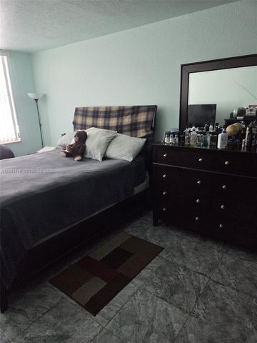 496 NW 165th St Road D214, Miami, FL 33169