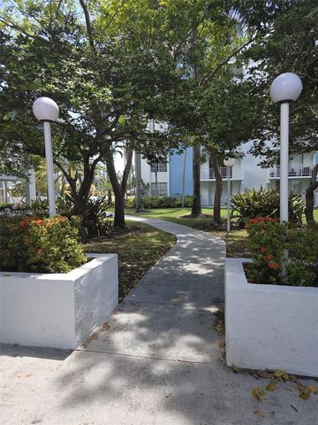 496 NW 165th St Road D214, Miami, FL 33169