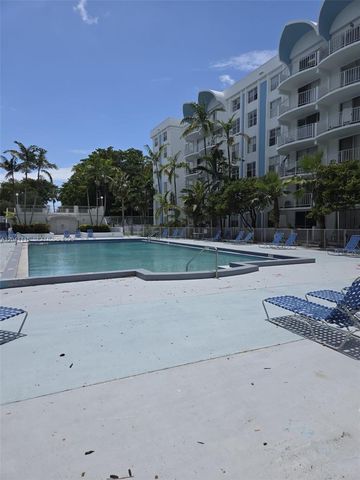 496 NW 165th St Road D214, Miami, FL 33169