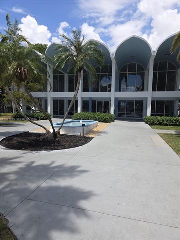 496 NW 165th St Road D214, Miami, FL 33169