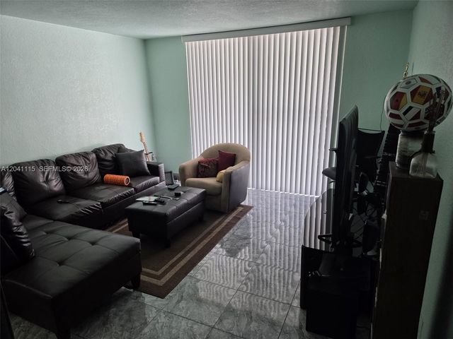496 NW 165th St Road D214, Miami, FL 33169
