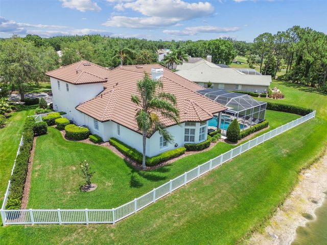 9105 WOODRIDGE RUN DRIVE, Tampa, FL 33647