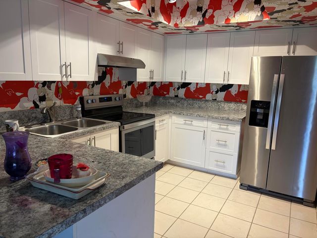 40 SPINNING WHEEL Lane, Tamarac, FL 33319