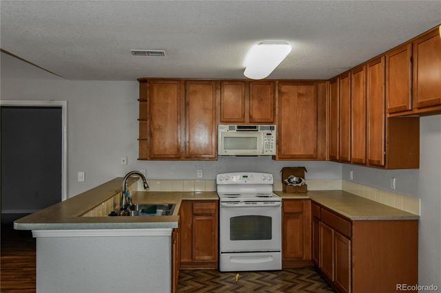 23306 5th Place E, Aurora, CO 80018