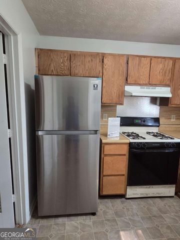 876 Indian Lake Drive NW, Lilburn, GA 30047