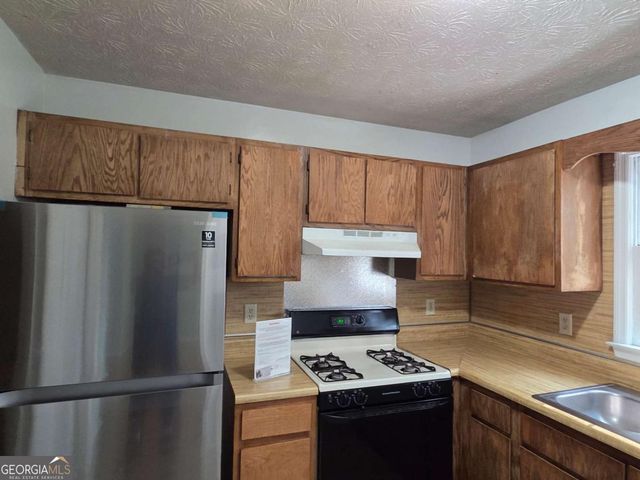 876 Indian Lake Drive NW, Lilburn, GA 30047