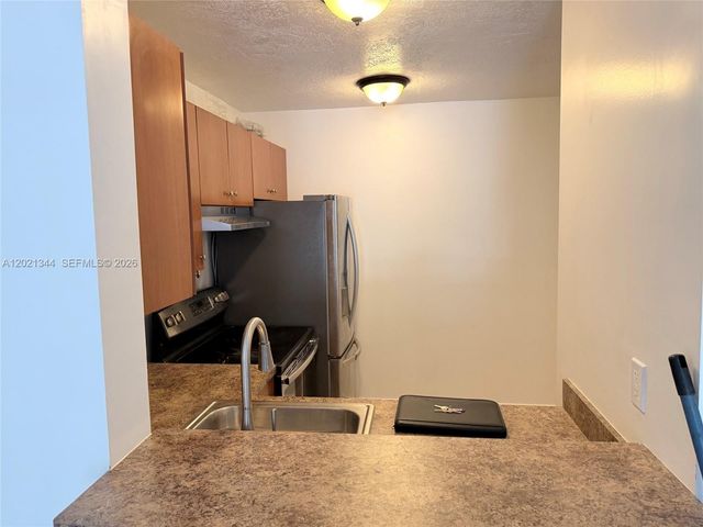 482 NW 165th St Rd A-103, Miami, FL 33169