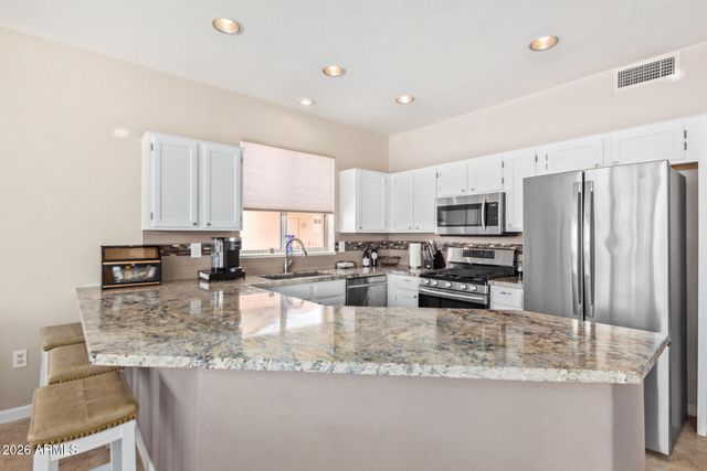 14606 W TRADING POST Drive, Sun City West, AZ 85375