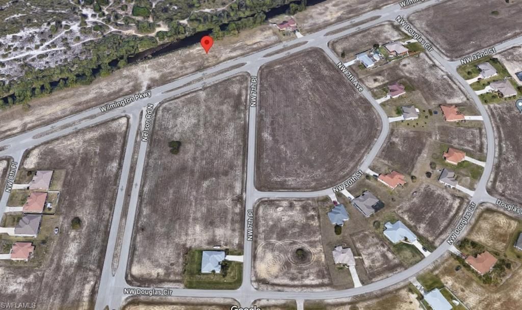 719 Wilmington PKWY, CAPE CORAL, FL 33993 — exterior