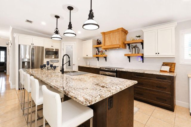 6164 N Ironwood Lane, Atlantis, FL 33462