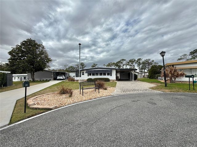 104 DOGWOOD TRAIL, Leesburg, FL 34748