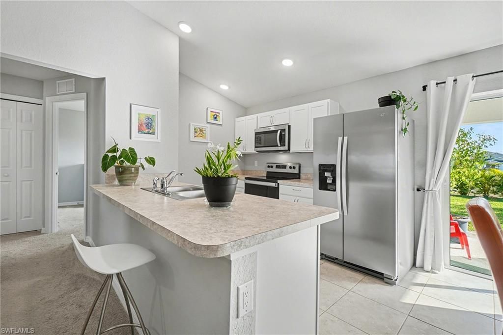 Image 10 of property listing at 2725 NW 19th PL, Cape Coral, FL 33993