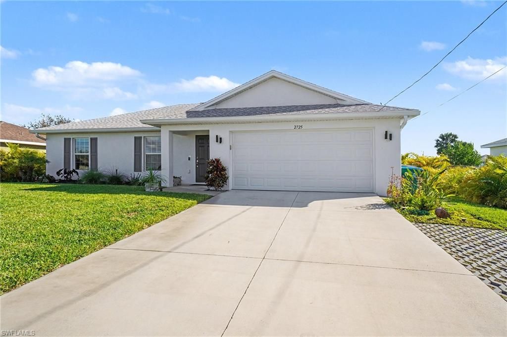 Image 3 of property listing at 2725 NW 19th PL, Cape Coral, FL 33993