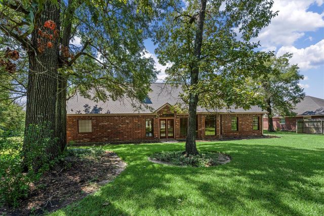 11875 Sagittarius Drive E, Willis, TX 77318