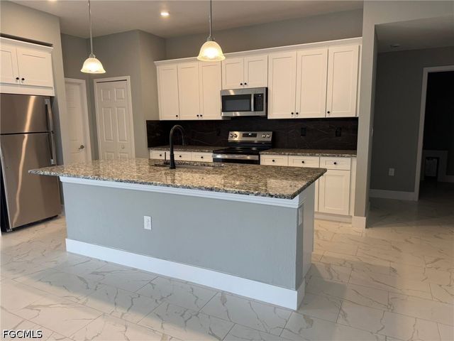 1005 Adeline AVE, Lehigh Acres, FL 33971