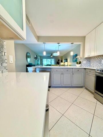 22148 Palms Way 101, Boca Raton, FL 33433