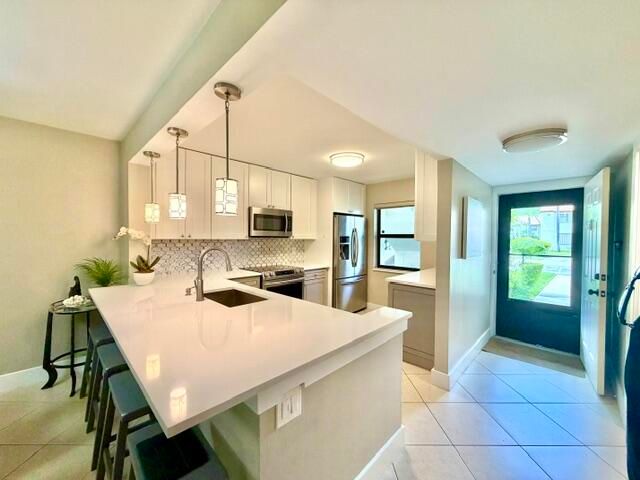 22148 Palms Way 101, Boca Raton, FL 33433