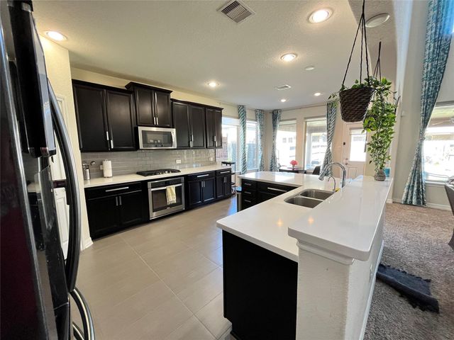 9406 Heath River Lane, Cypress, TX 77433