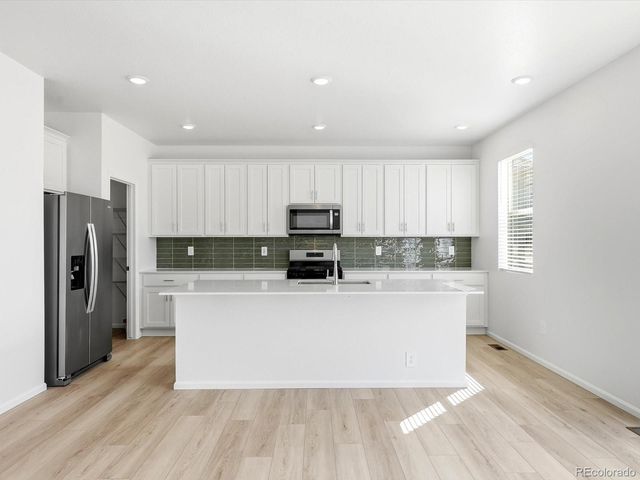 1608 Rumley Creek Drive, Windsor, CO 80550