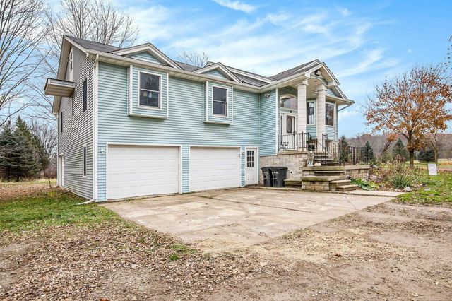 9777 Lambs Road, Wales, MI 48027