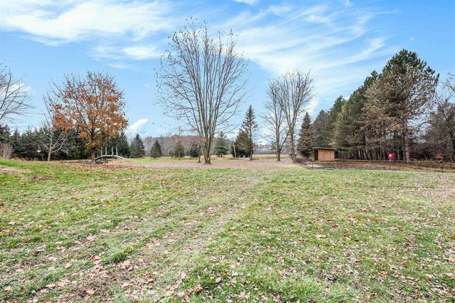 9777 Lambs Road, Wales, MI 48027