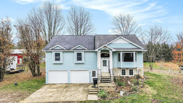 9777 Lambs Road, Wales, MI 48027