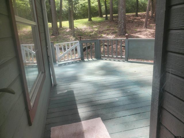 231 Lamplight Path, Holly Lake Ranch, TX 75765