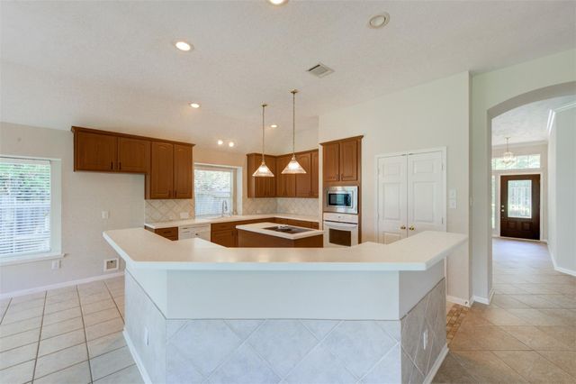 9026 Robinhoods Well Drive, Spring, TX 77379