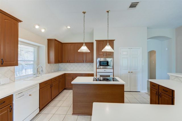 9026 Robinhoods Well Drive, Spring, TX 77379