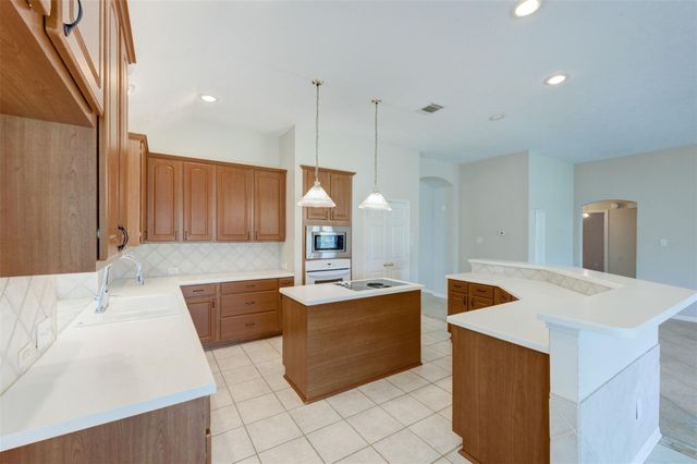 9026 Robinhoods Well Drive, Spring, TX 77379