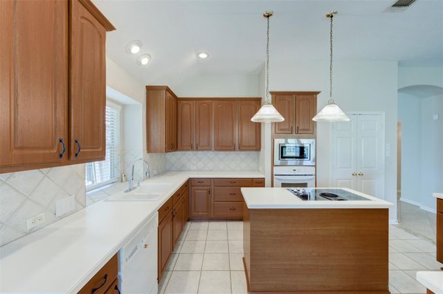 9026 Robinhoods Well Drive, Spring, TX 77379