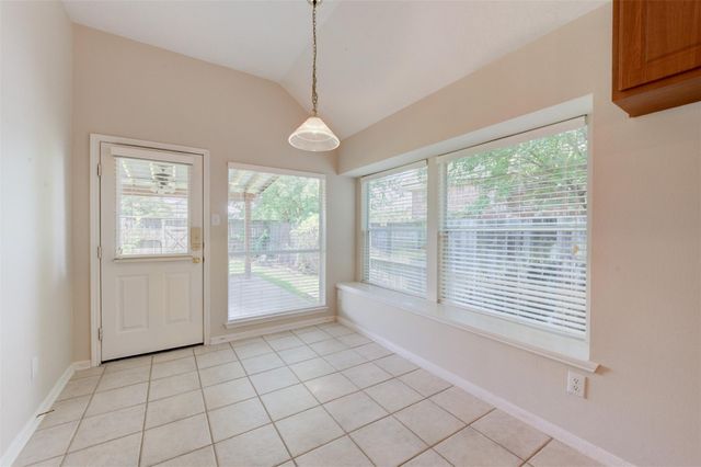 9026 Robinhoods Well Drive, Spring, TX 77379