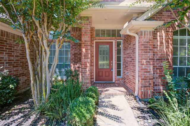9026 Robinhoods Well Drive, Spring, TX 77379