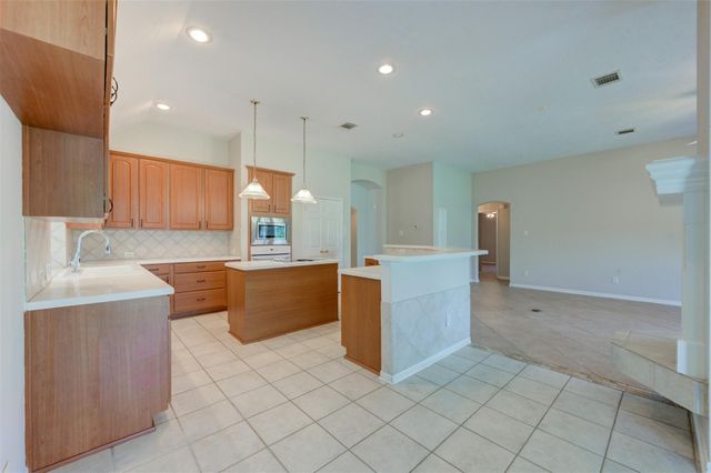 9026 Robinhoods Well Drive, Spring, TX 77379