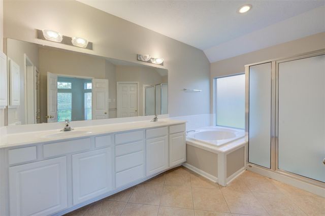 9026 Robinhoods Well Drive, Spring, TX 77379