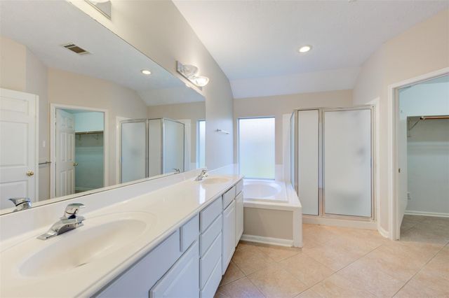 9026 Robinhoods Well Drive, Spring, TX 77379