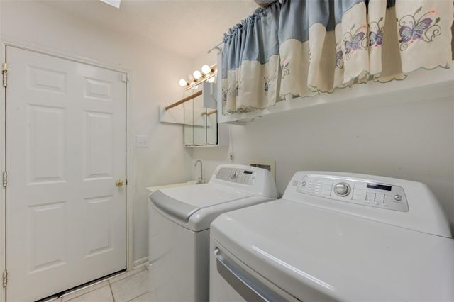 9026 Robinhoods Well Drive, Spring, TX 77379