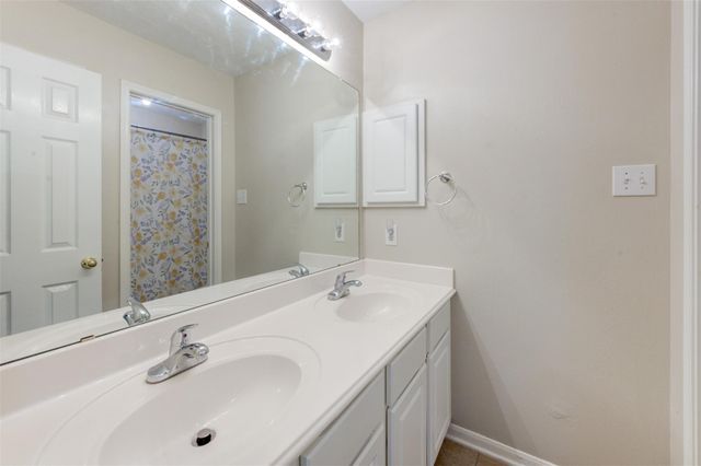 9026 Robinhoods Well Drive, Spring, TX 77379