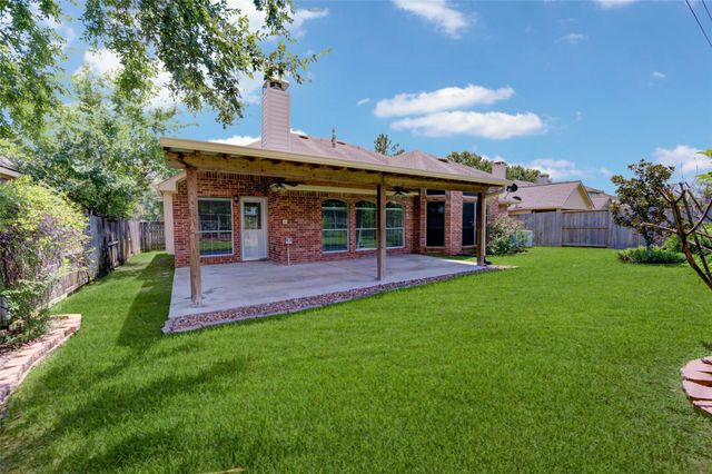 9026 Robinhoods Well Drive, Spring, TX 77379