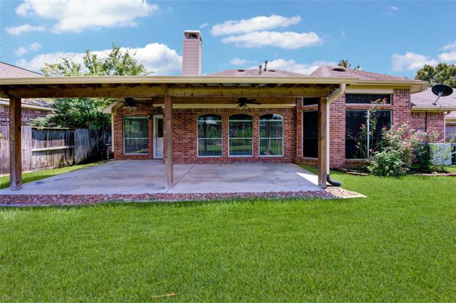 9026 Robinhoods Well Drive, Spring, TX 77379